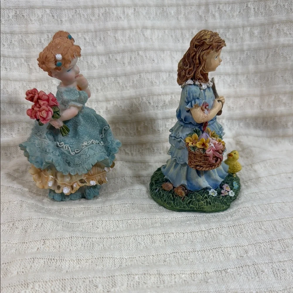 Charming Figurine Set with Blue and Pink Accents